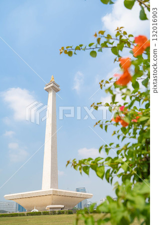 Jakarta's Monas (Independence Monument) - Indonesia's symbol towering against the blue sky 132016903