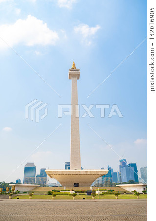 Jakarta's Monas (Independence Monument) - Indonesia's symbol towering against the blue sky 132016905