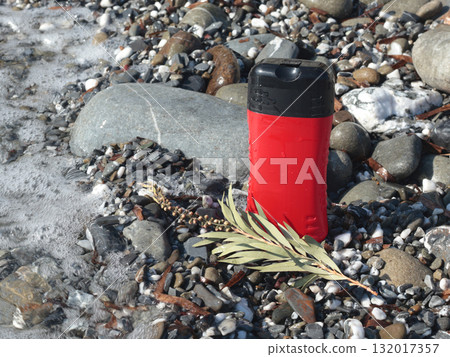 Plastic red beauty jar against backdrop of natural elements. Cosmetics and facial and hair care. Mock-up template for design. Eco-friendly products. Background, design composition. 132017357