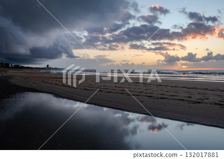 Nieuwpoort, West-Vlaanderen, Belgium, September 13th, 2025, A Serene Beach Sunset featuring an 132017881