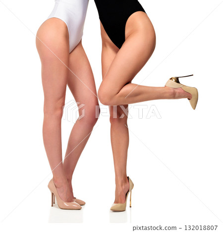 Slim long female legs with smooth and soft skin, isolated on white background 132018807