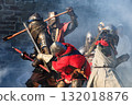 Medieval knights in severe battle action 132018876