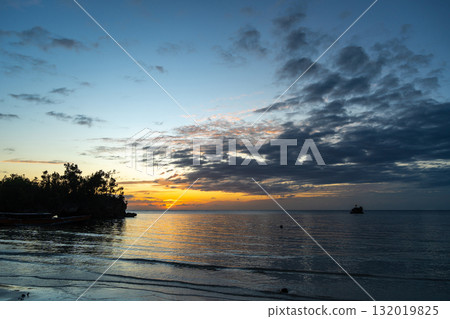 Sunset on Lia beach, Waleakodi Island, Togian archipelago, Sulawesi, Indonesia Sunset on Lia beach, Waleakodi Island, Togian archipelago, Sulawesi, Indonesia 132019825