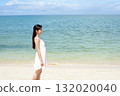woman relaxing on the beach 132020040