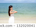 woman relaxing on the beach 132020041