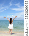woman relaxing on the beach 132020042