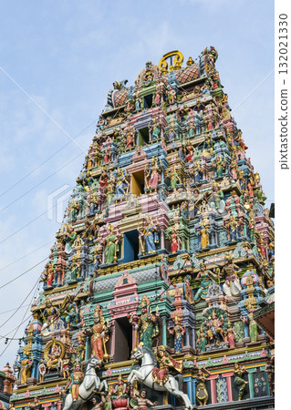 A Hindu temple with colorful statues 132021330