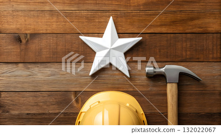 Construction tools and decor on wooden background highlight craftsmanship and creativity Construction tools and decor on wooden background highlight craftsmanship and creativity 132022067