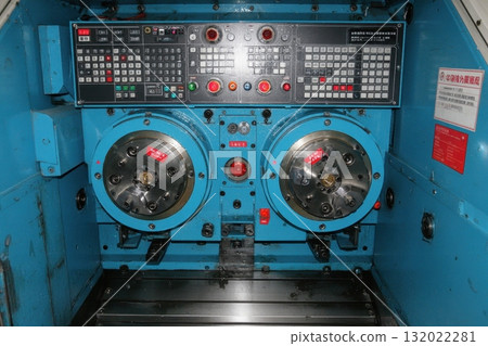 This machine center features a control panel, chucks, and precision engineering designed for metalworking and tooling in an industrial setting 132022281