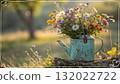 Rustic Flower Vase in Sunlit Garden.Turquoise watering can with wildflowers on grass, glowing in warm sunlight. Perfect for spring, nature, and romantic themes. 132022722