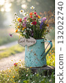 Rustic Flower Vase in Sunlit Garden.Turquoise watering can with wildflowers on grass, glowing in warm sunlight. Perfect for spring, nature, and romantic themes. 132022740