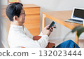 Male man who operates a smartphone 132023444