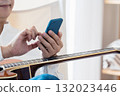 Male man who operates a smartphone 132023446
