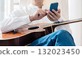 Male man who operates a smartphone 132023450