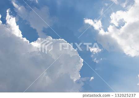Light leaking from the sun hidden behind white clouds Light leaking from the sun hidden behind white clouds 132025237