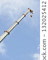 A crane extending into the blue sky 132025412