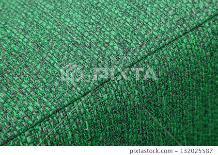 Textured green furniture fabric with stitching 132025587