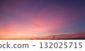 Magical pink and purple sunset sky, mobile photo. Vibrant evening sky with colorful clouds, perfect for illustrating nature, landscape, and atmospheric scenery. 132025715