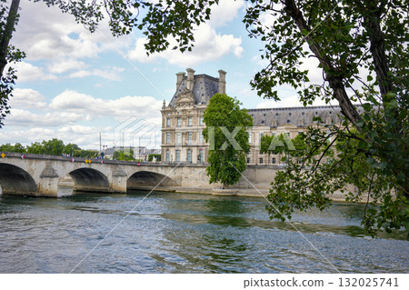Louvre Museum and Pont Royal bridge over the Seine River in Paris, France Louvre Museum and Pont Royal bridge over the Seine River in Paris, France 132025741