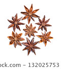 Star anise, circle on white background. Star shaped fruits and seeds of Illicium verum, also known as badian, and as star aniseed, a spice that closely resembles anise in flavor. Close-up, from above. 132025753