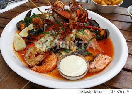 Grilled seafood platter on wooden table Grilled seafood platter on wooden table 132026539