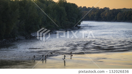 Surfers enjoy the tidal bore at Vague du Mascaret in Podensac, Gironde 132026836