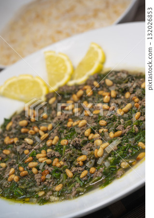 Spinach or Sabanekh with chicken a Mediterranean dish served with rice Spinach or Sabanekh with chicken a Mediterranean dish served with rice 132026853