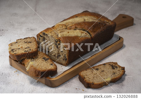 Delicious homemade banana bread sliced and ready to enjoy Delicious homemade banana bread sliced and ready to enjoy 132026888