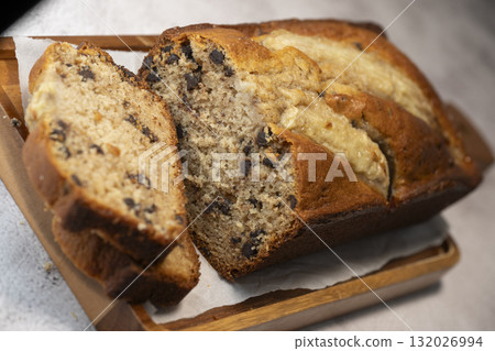 Delicious homemade banana bread sliced and ready to enjoy 132026994