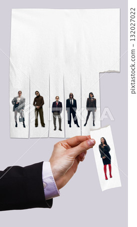Creative composition. Hand selecting candidate strip from creative paper sheet of applicants 132027022