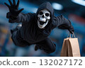 Happy person wearing death grim reaper costume flying and holding shopping bags in a mall. 132027172