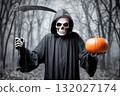 Grim reaper in skeleton mask holding scythe and pumpkin standing in a dark spooky forest 132027174