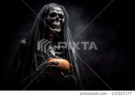 Grim reaper holding pumpkin in the dark 132027177