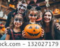 Halloween pumpkins with a happy family in background. 132027179
