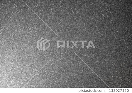 Bright silver granular glitter background with gradient light and sparkles creating soft depth Bright silver granular glitter background with gradient light and sparkles creating soft depth 132027350