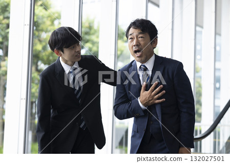 Businessman with poor physical condition Businessman with poor physical condition 132027501