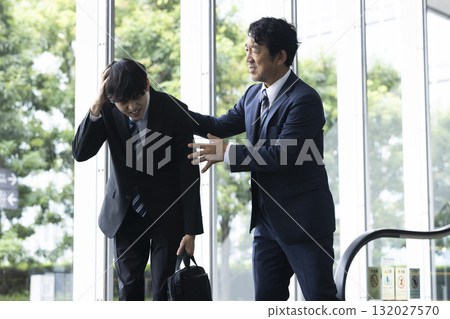 Businessman with poor physical condition 132027570