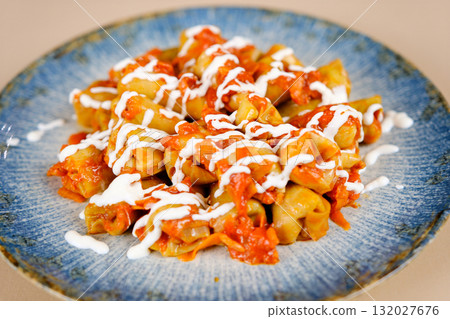 Cabbage rolls sauce Stuffed cabbage leaves. Cabbage wraps. Chou farci, dolma, sarma, golubtsy or golabki. Flat lay, layout, overhead 132027676