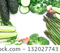 frame of green vegetables broccoli, arugula, cucumber, asparagus and garlic on white background 132027743