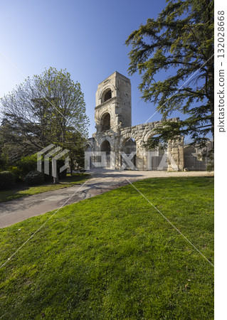 Arles Roman amphitheater arches and tower in Jardin d'Ete 132028668