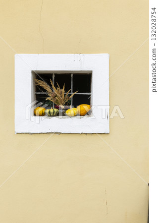 Window decorating with autumn harvest gourds in Zellerndorf, Austria 132028754