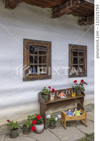 Traditional Slovak folk house with handmade rag dolls Traditional Slovak folk house with handmade rag dolls 132028769