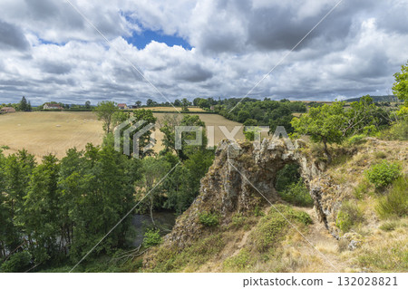 Rock formation natural arch in Pierre Perthuis landscape 132028821