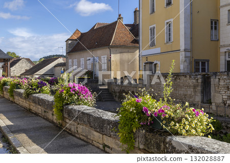 Stone bridge with vibrant flowers in Europe Stone bridge with vibrant flowers in Europe 132028887