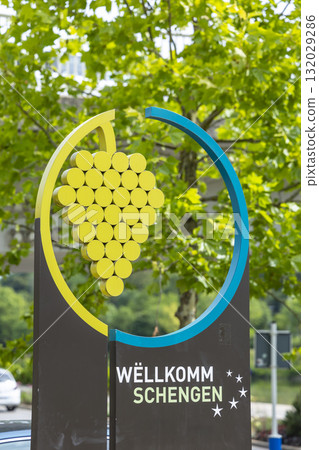 Schengen welcome sign featuring grape design and stars Schengen welcome sign featuring grape design and stars 132029286