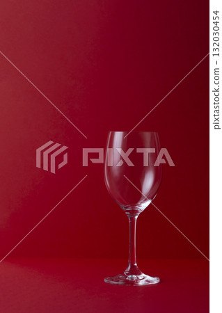 Wine glasses on a red background. Wine glasses on a red background. 132030454