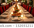 Festive table with delicious appetizers and snacks. Holiday banquet serving with fancy glasses and silverware in restaurant. Wedding birthday party celebration. 132031211