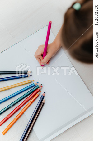 Childrens Drawing Using Vibrant Colored Pencils on Blank Paper A Fun BacktoSchool Art Activity Childrens Drawing Using Vibrant Colored Pencils on Blank Paper A Fun BacktoSchool Art Activity 132032320