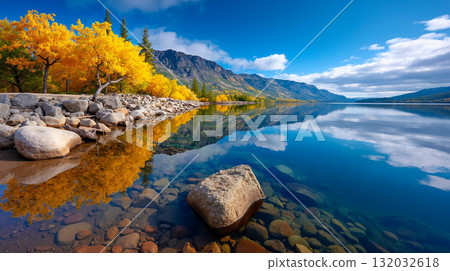 A lake with rocks and trees in the middle of it A lake with rocks and trees in the middle of it 132032618