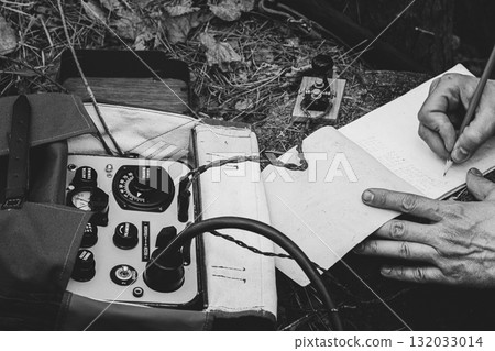 Russian Soviet Infantry Red Army Soldier In World War II using Russian Soviet Portable Radio Transceiver In Trench Entrenchment In Spring Autumn Forest. 4K. Headphones And Telegraph Key. Close Up Russian Soviet Infantry Red Army Soldier In World War II using Russian Soviet Portable Radio Transceiver In Trench Entrenchment In Spring Autumn Forest. 4K. Headphones And Telegraph Key. Close Up 132033014